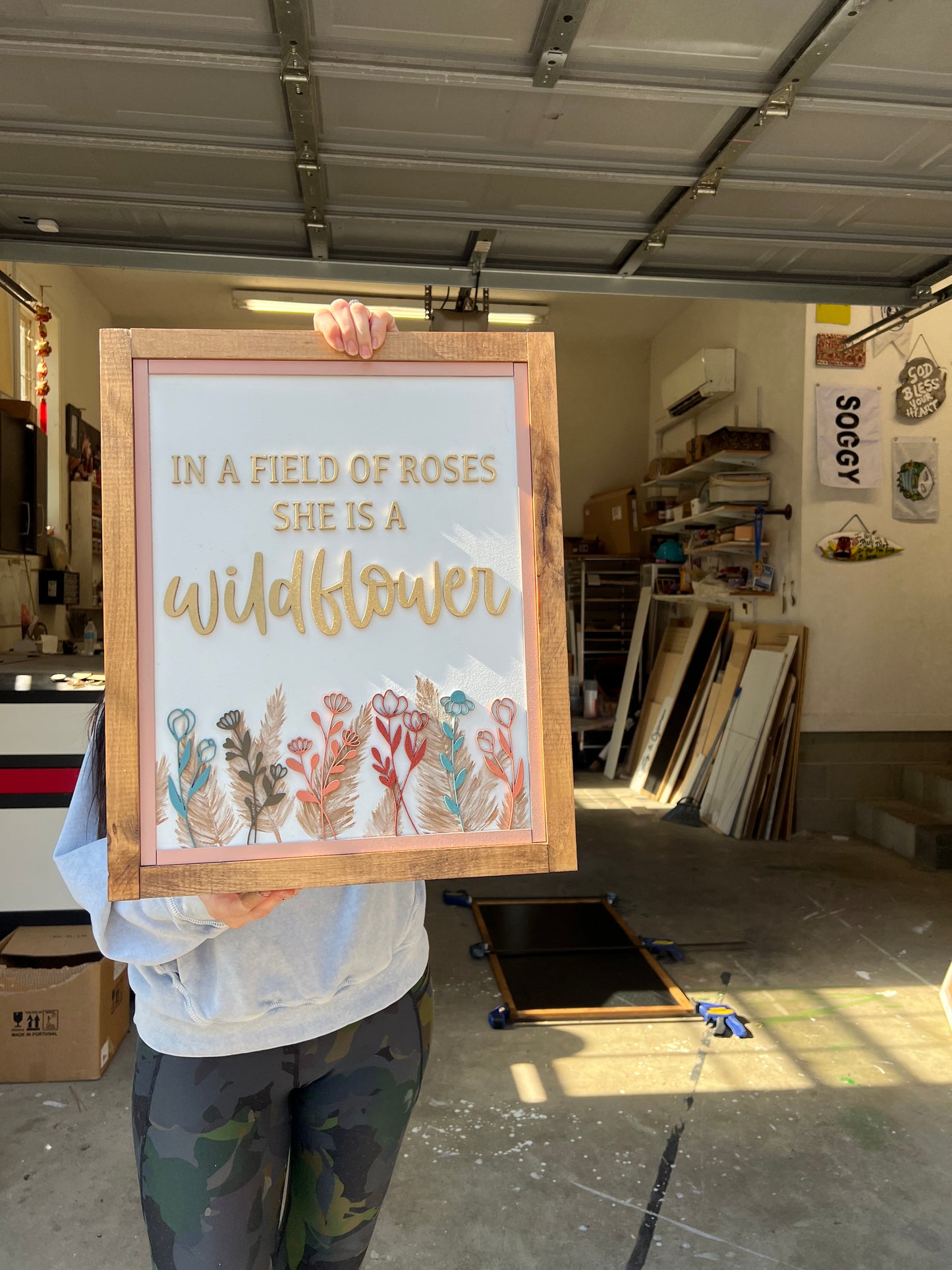 In a field of roses she is a wildflower sign. 16x20