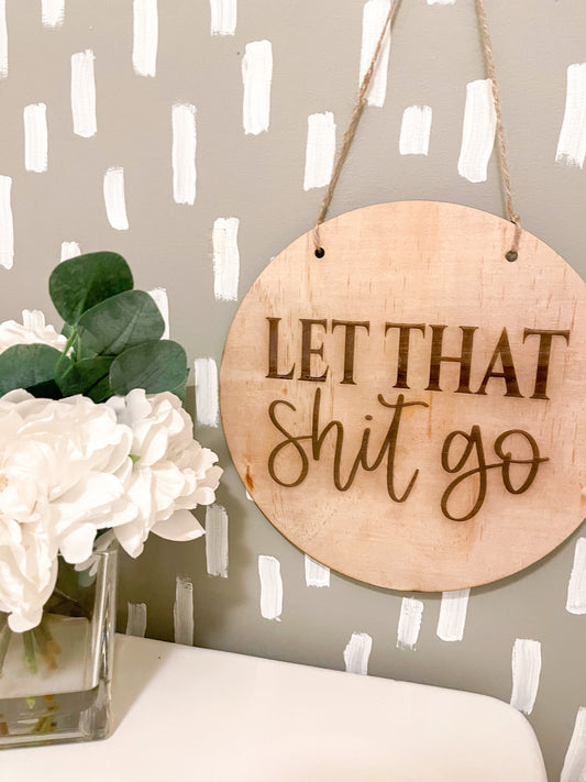 “Let it go” bathroom sign